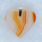 Carnelian Agate Pendant.  Indonesian Agates exhibit a wide variety of colors and amazing complexity.  No two agates are exactly alike, each one being a unique and beautiful creation!  