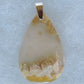 Find your perfect Indonesian Agate on our store!  The pendant bail is authentic 925 sterling silver.