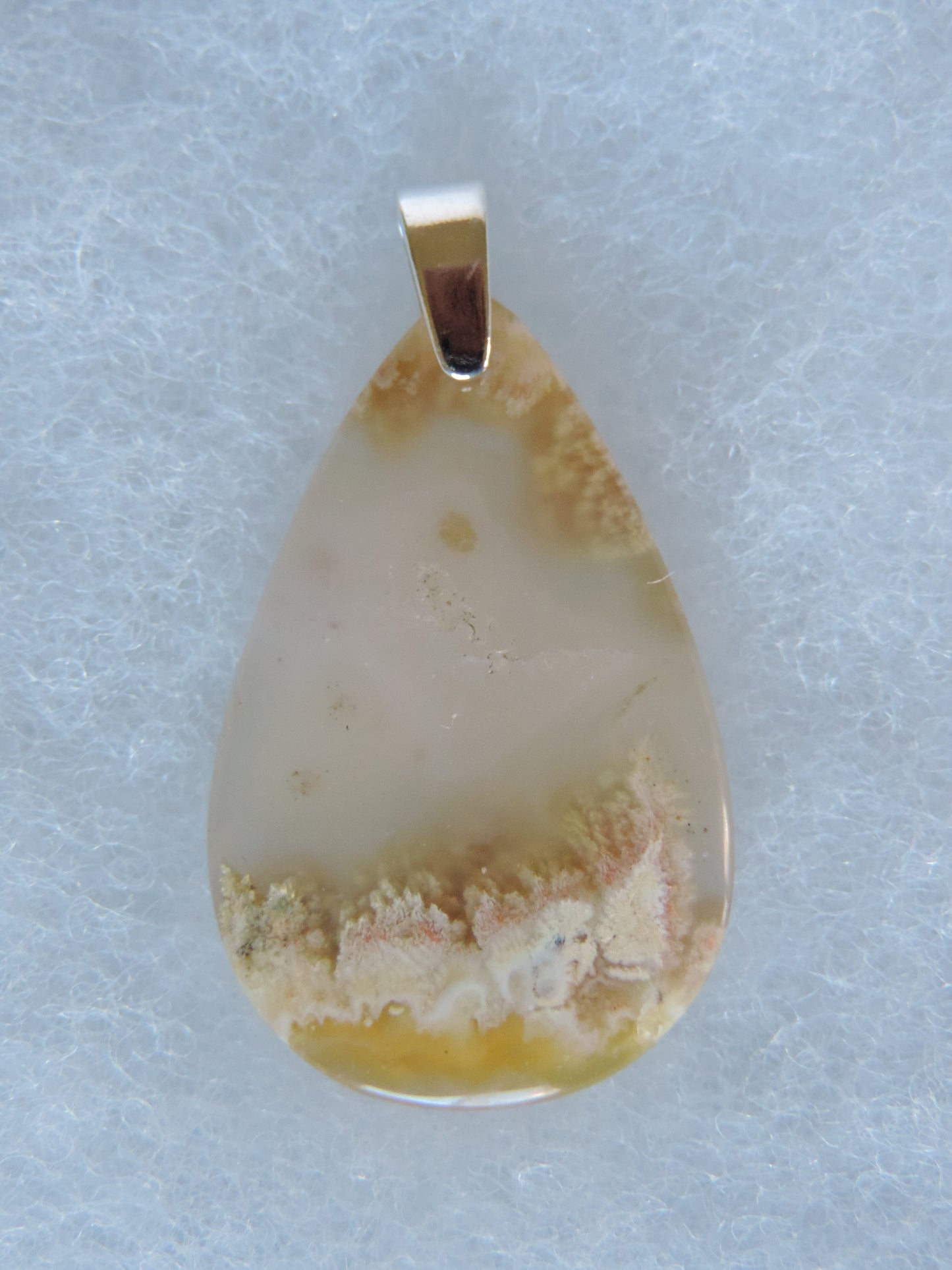 Find your perfect Indonesian Agate on our store!  The pendant bail is authentic 925 sterling silver.