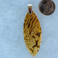 This stone is a natural color, no dyes or heat treatment have been used.  It was photographed without filters in natural light; however, slight color variations may occur due to digitization.  Natural stones can have nooks and crannies, inclusions or small cracks, these distinguishing features lend character to the piece.