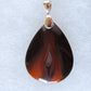 Timor Agate & Sterling Silver Pendant.  Timor Agate Pendant  Indonesian Agates exhibit a wide variety of colors and amazing complexity.  No two agates are exactly alike, each one being a unique and beautiful creation!