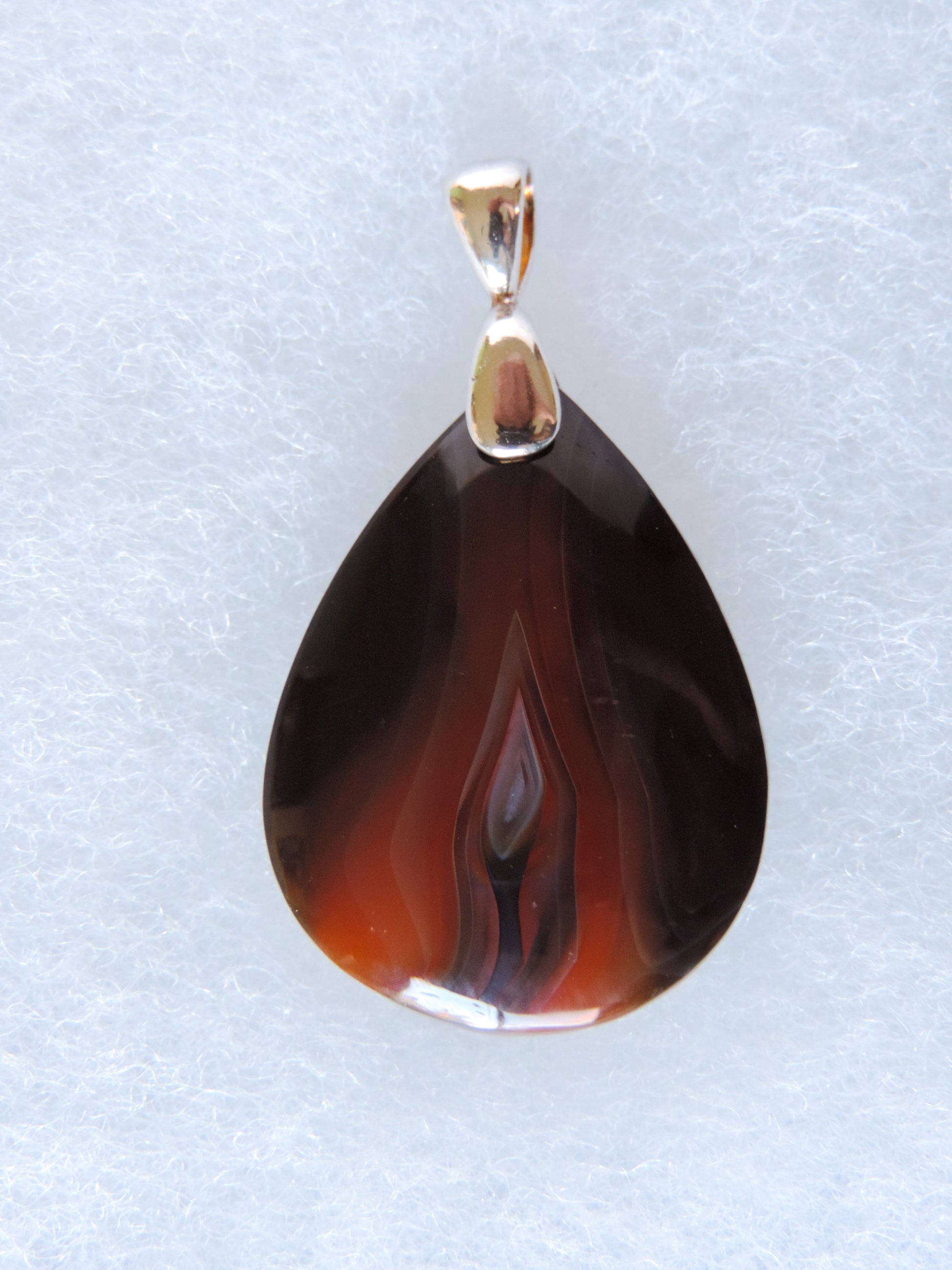 Timor Agate & Sterling Silver Pendant.  Timor Agate Pendant  Indonesian Agates exhibit a wide variety of colors and amazing complexity.  No two agates are exactly alike, each one being a unique and beautiful creation!