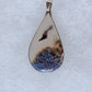 Moss Agate Pendant.  Indonesian Agates exhibit a wide variety of colors and amazing complexity.  No two agates are exactly alike, each one being a unique and beautiful creation!  Agates with multiple bands of color are known as fortification agates, those with dendritic or moss looking inclusions are referred to as moss agate and many others are given descriptive names relative to their appearance or where they are found.