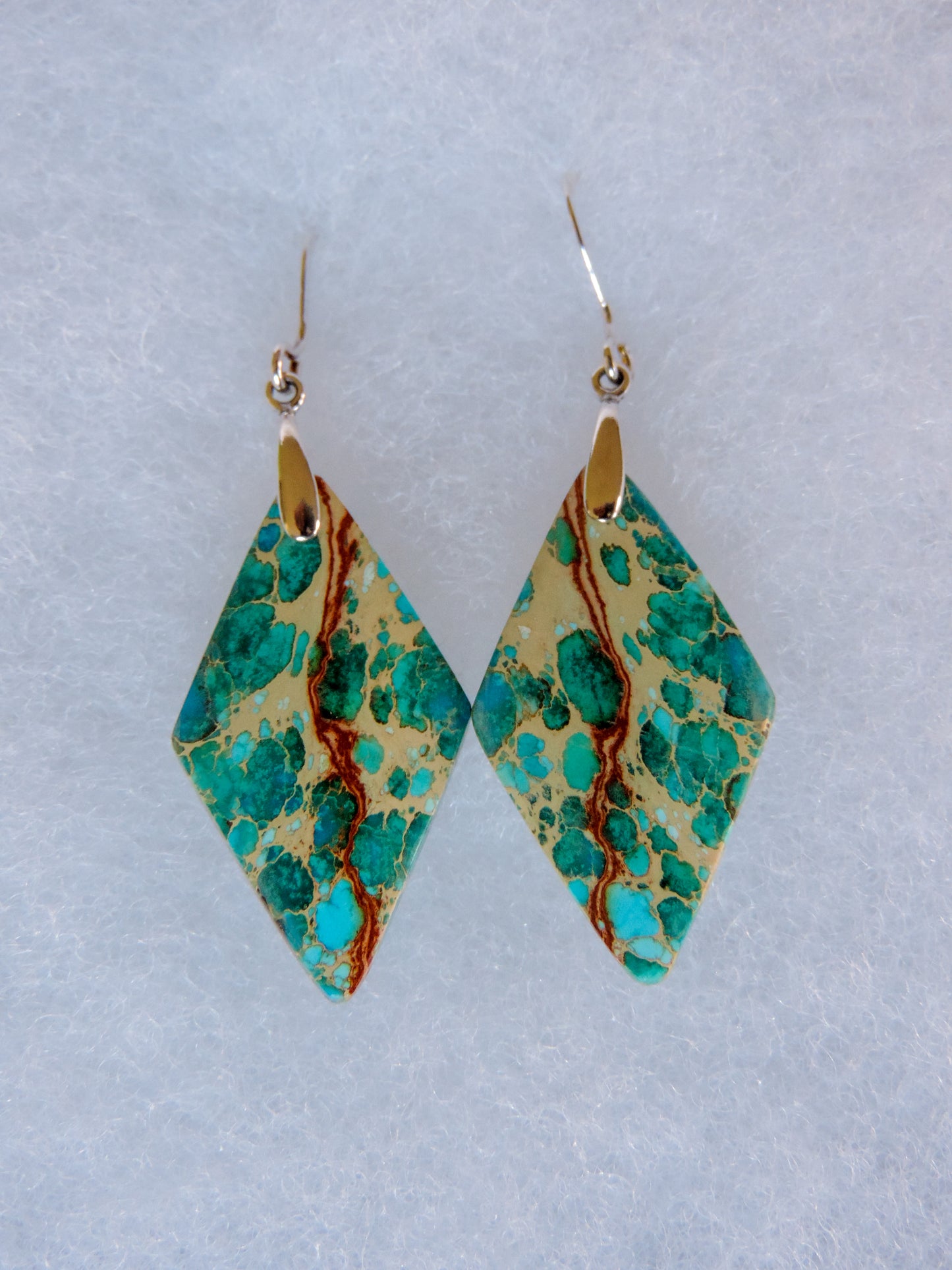 Pick your favorite Blue Sea Sediment Jasper Earrings and enjoy!     The bail and earring wire are authentic 925 sterling silver.