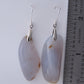  The bail and earring wires are authentic 925 sterling silver.  Wear these original earrings and stand out in a crowd!  Known as the Treasure State, Montana’s landscape is an abundant resource for precious and semi-precious stones.  One of the semi-precious stones, Madison Blue Agate, are featured in these earrings.  
