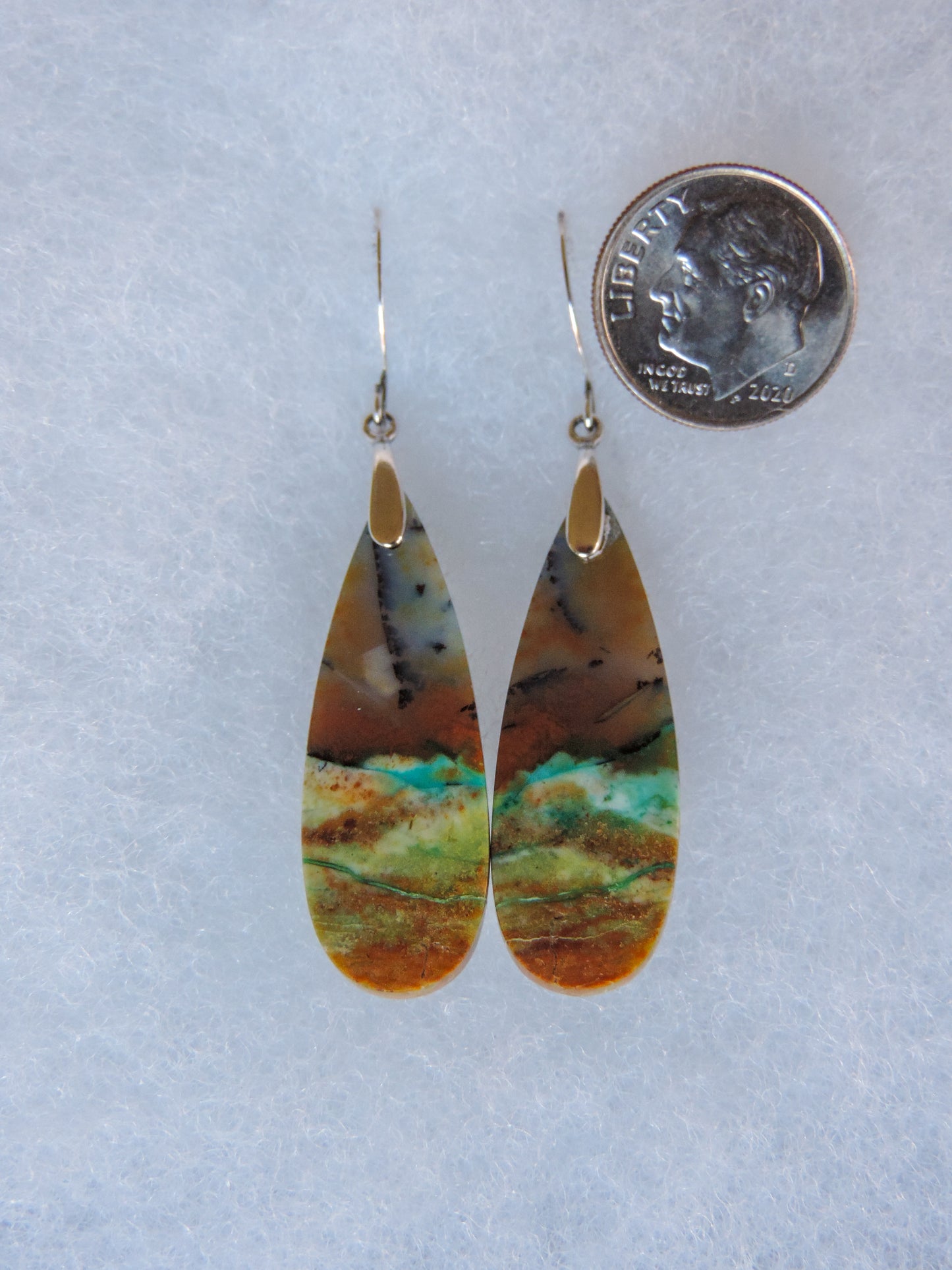 Your Blue Opalized Wood Earrings will be shipped the same day in most cases, Monday through Friday.  Orders will be shipped first class USPS, which takes 3-4 days in the U.S. for delivery.  If your earrings arrive damaged or you are dissatisfied, please contact us upon receipt of item.