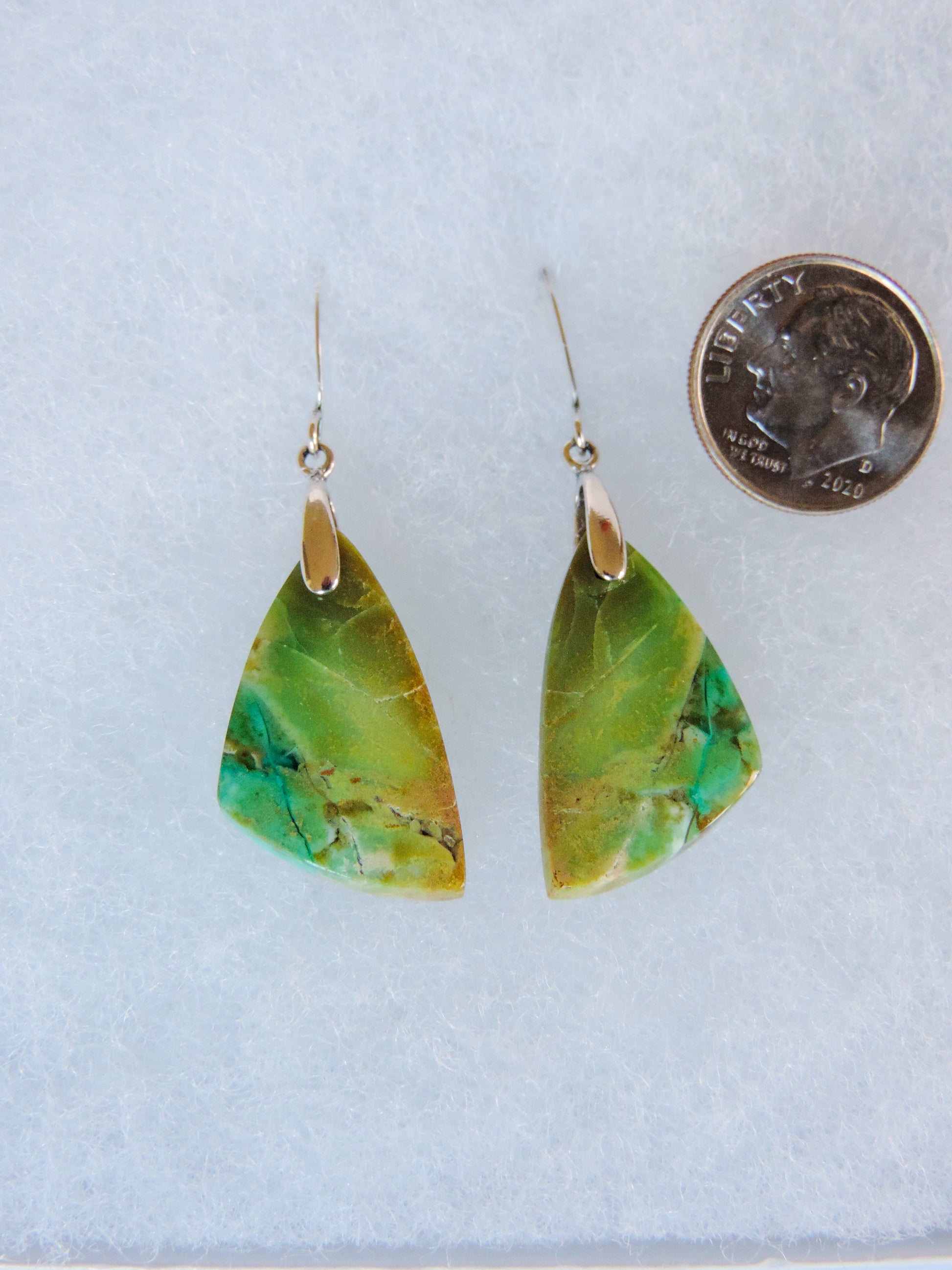 Your Blue Opalized Wood Earrings will be shipped the same day in most cases, Monday through Friday.  Orders will be shipped first class USPS, which takes 3-4 days in the U.S. for delivery.  If your jewelry earrings arrive damaged or you are dissatisfied, please contact us upon receipt of item.