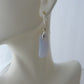 The bail and earring wires are authentic 925 sterling silver.  Wear these original earrings and stand out in a crowd!  Known as the Treasure State, Montana’s landscape is an abundant resource for precious and semi-precious stones.  One of the semi-precious stones, Madison Blue Agate, are featured in these earrings.  