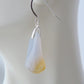 The bail and earring wires are authentic 925 sterling silver.  Wear these original earrings and stand out in a crowd!  Known as the Treasure State, Montana’s landscape is an abundant resource for precious and semi-precious stones.  One of the semi-precious stones, Madison Blue Agate, are featured in these earrings.  