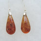 Amber & Sterling Silver Earrings.   These will top off any outfit! Pick a pair of beautiful Amber & Sterling Silver Earrings.   One of a kind, completely unique and hand crafted by an independent master artist!!  The bail and earring wires are authentic 925 sterling silver.