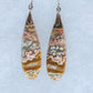 This stone is a natural color, no dyes or heat treatment have been used.  It was photographed without filters in natural light; however, slight color variations may occur due to digitization.  Natural stones can have nooks and crannies, inclusions or small cracks, these distinguishing features lend character to the piece.