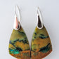 The bail and earring wires are authentic 925 sterling silver.  Feel treasured when you wear these earrings! Extremely rare and lovely, Indonesian Blue Opalized Wood is a cherished material used by lapidary artists for creating stunning pieces of jewelry.  The material was first found as pebbles and rounded stones in streams and near the slopes of three volcanoes in the West Java Province. 