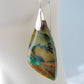 The bail and earring wires are authentic 925 sterling silver.  Feel treasured when you wear these earrings! Extremely rare and lovely, Indonesian Blue Opalized Wood is a cherished material used by lapidary artists for creating stunning pieces of jewelry.  The material was first found as pebbles and rounded stones in streams and near the slopes of three volcanoes in the West Java Province. 