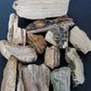 Petrified/Agatized Wood Bundle  Created millions of years ago, petrified and agatized wood is found around the globe in numerous locations.  The stones’ distinctive appearance is determined by different conditions that include the tree species that was buried, the location and type of geological event that buried the trees, and the minerals present in the silica that ultimately replaced the woods organic composition.  Brought to you from the 