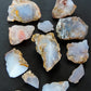 Madison Blue Agate bundle.   Known as the Treasure State, Montana’s landscape is an abundant resource for precious and semi-precious stones.  One of the semi-precious stones, Madison Blue Agate, is featured in this group.  This rare stone is hand collected on private land in the mountains of Montana.  These natural unrefined stones can have nooks and crannies, inclusions, or small cracks, these distinguishing features lend character to the piece.