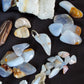 8 small madison blue agate (polished) $10.99  12 extra small madison blue agate (polished) $10.99  1 madison blue agate key chain (large) $11.99  Quartz Crystals... 1 double point cluster and three single points, $7.50  Total Value - $161.94 Sale Price