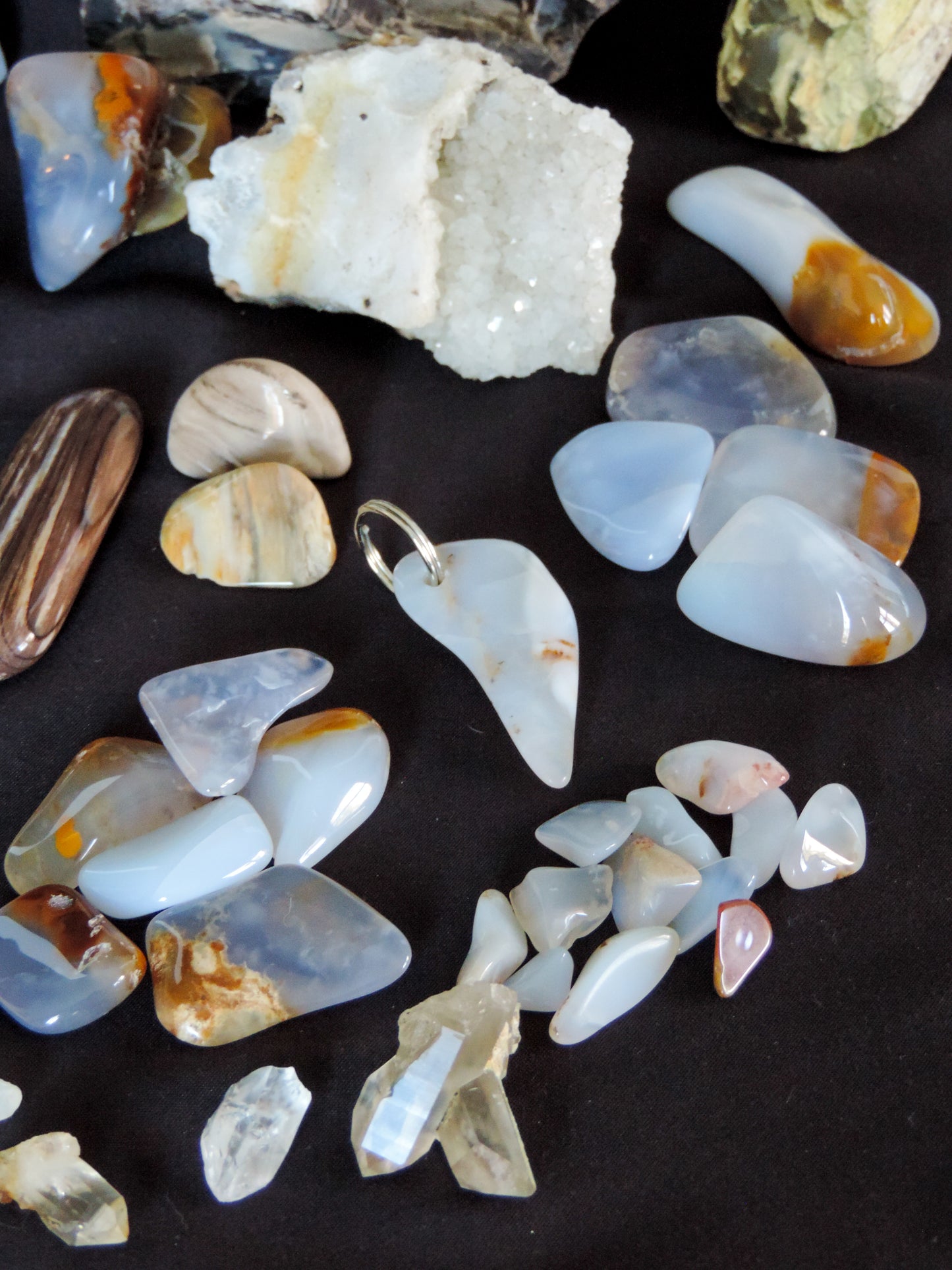 8 small madison blue agate (polished) $10.99  12 extra small madison blue agate (polished) $10.99  1 madison blue agate key chain (large) $11.99  Quartz Crystals... 1 double point cluster and three single points, $7.50  Total Value - $161.94 Sale Price