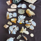 Yellowstone Country Treasure Sampler.  Natural earth items in this sampler package include:  1 large black agatized wood with really nice crystal pocket, $32  1 large petrified wood (rough) $19.75  1 medium petrified/agatized wood (rough) $15.75  2 polished petrified wood (medium) $10.99  3 polished petrified wood (small) $10.99  1 medium madison blue agate, high quality (rough) $7  1 polished agate slab, $5  1