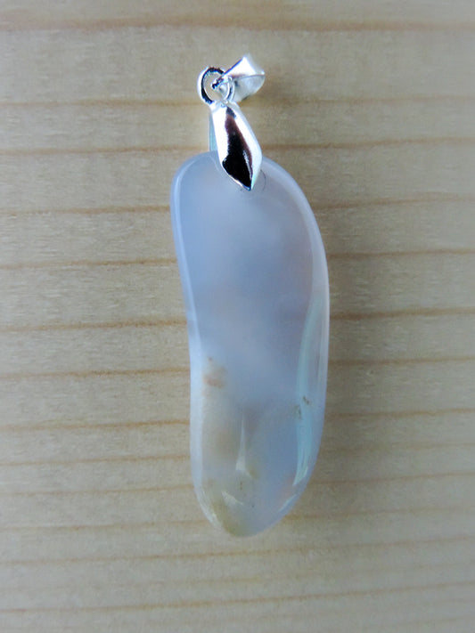 This rare stone is found in only a few locations in Montana, our material is hand collected on private property in the mountains and carried out in backpacks...each piece worth its weight in every step!  The translucent blue agate and its color variations have an alluring effect, many people find the blue agate a relaxing, calming and peaceful stone to wear.  Original and unique in design, each piece is hand crafted by lapidary artists in Montana.