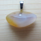 This rare stone is found in only a few locations in Montana, our material is hand collected on private property in the mountains and carried out in backpacks...each piece worth its weight in every step!  The translucent blue agate and its color variations have an alluring effect, many people find the blue agate a relaxing, calming and peaceful stone to wear.  Original and unique in design, each piece is hand crafted by lapidary artists in Montana. 
