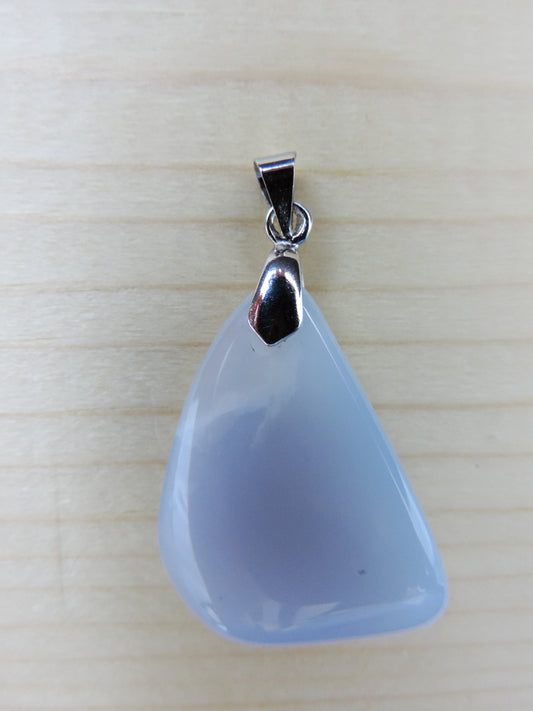 This rare stone is found in only a few locations in Montana, our material is hand collected on private property in the mountains and carried out in backpacks...each piece worth its weight in every step!  The translucent blue agate and its color variations have an alluring effect, many people find the blue agate a relaxing, calming and peaceful stone to wear.  Original and unique in design, each piece is hand crafted by lapidary artists in Montana.