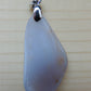 This rare stone is found in only a few locations in Montana, our material is hand collected on private property in the mountains and carried out in backpacks...each piece worth its weight in every step!  The translucent blue agate and its color variations have an alluring effect, many people find the blue agate a relaxing, calming and peaceful stone to wear.  Original and unique in design, each piece is hand crafted by lapidary artists in Montana. 