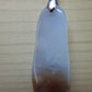 Montana Madison Blue Agate Pendant.  The stone in this pendant is a unique result of tumble shaping and polishing a piece of agate from its natural state.  The pendant is reversible, allowing you to present its natural beauty from either side to be admired by all.  This one of a kind pendant will show off your unique taste!    
