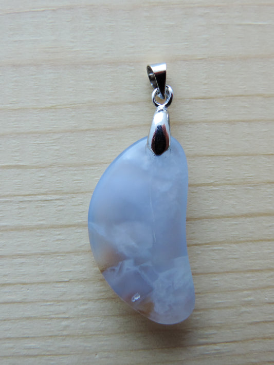 This rare stone is found in only a few locations in Montana, our material is hand collected on private property in the mountains and carried out in backpacks...each piece worth its weight in every step!  The translucent blue agate and its color variations have an alluring effect, many people find the blue agate a relaxing, calming and peaceful stone to wear.  Original and unique in design, each piece is hand crafted by lapidary artists in Montana.